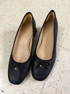 Coach Black Leather Ballet Heels with Bow and Gold 'C' Accent